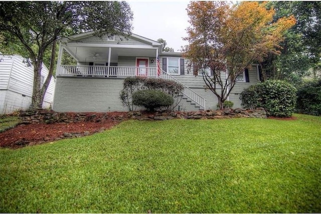 2002 Shalimar Dr NE, Chamblee, GA 30345 - view of front facade featuring a front yard, stairway, and a porch