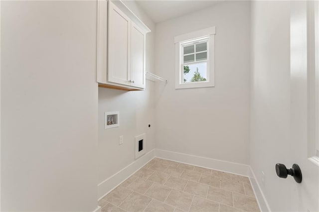 clothes washing area with cabinets, light tile patterned floors, hookup for an electric dryer, and hookup for a washing machine