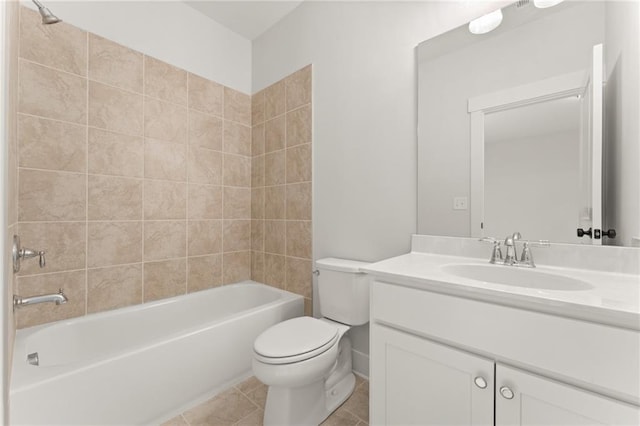 full bathroom with toilet, tile patterned floors, tiled shower / bath combo, and vanity