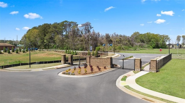 view of community featuring a lawn