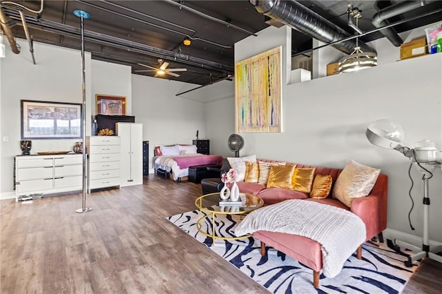 120 Ralph Mcgill Blvd NE Unit 1409, Atlanta, GA 30308 - living room with wood finished floors and baseboards