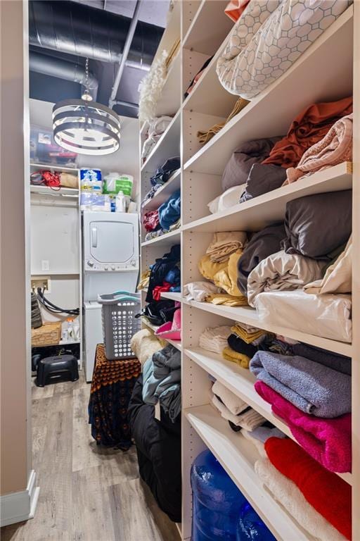 120 Ralph Mcgill Blvd NE Unit 1409, Atlanta, GA 30308 - walk in closet with wood finished floors