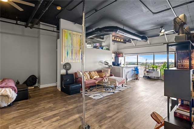 120 Ralph Mcgill Blvd NE Unit 1409, Atlanta, GA 30308 - below grade area featuring a ceiling fan, wood finished floors, and freestanding refrigerator