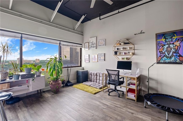 120 Ralph Mcgill Blvd NE Unit 1409, Atlanta, GA 30308 - office area featuring wood finished floors and a towering ceiling