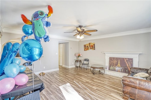 6414 Wedgewood Trce, Tucker, GA 30084 - exercise area featuring a high end fireplace, light hardwood / wood-style floors, ceiling fan, and ornamental molding