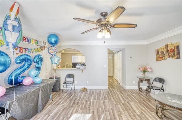 6414 Wedgewood Trce, Tucker, GA 30084 - interior space featuring ceiling fan, crown molding, and hardwood / wood-style flooring