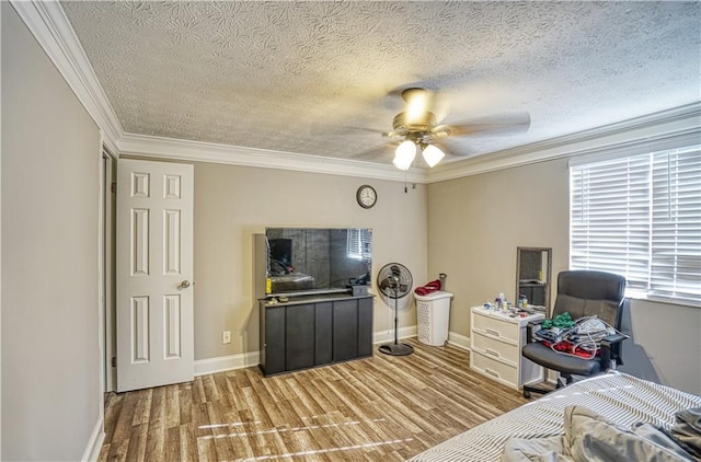 6414 Wedgewood Trce, Tucker, GA 30084 - bedroom with a textured ceiling, ceiling fan, crown molding, and light hardwood / wood-style flooring