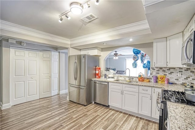6414 Wedgewood Trce, Tucker, GA 30084 - kitchen with ceiling fan, sink, white cabinetry, and stainless steel appliances