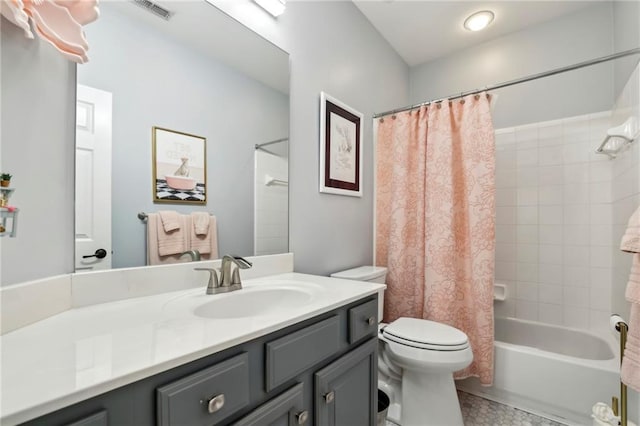 bathroom with visible vents, toilet, shower / bathtub combination with curtain, and vanity