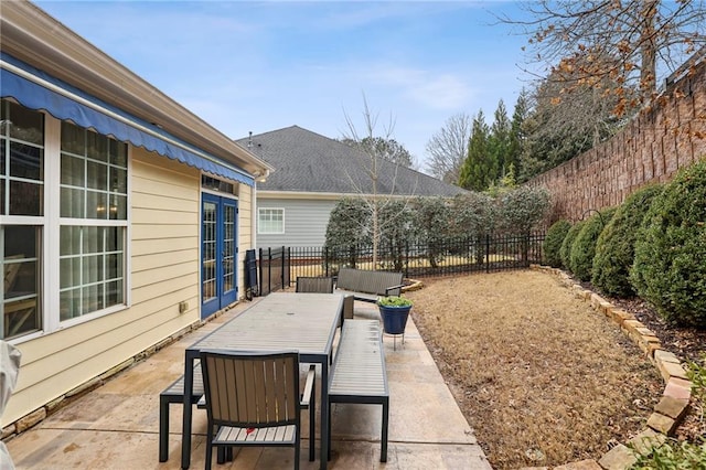 view of patio / terrace with a fenced backyard and outdoor dining space