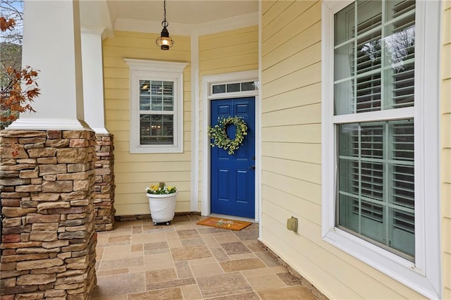 doorway to property with covered porch