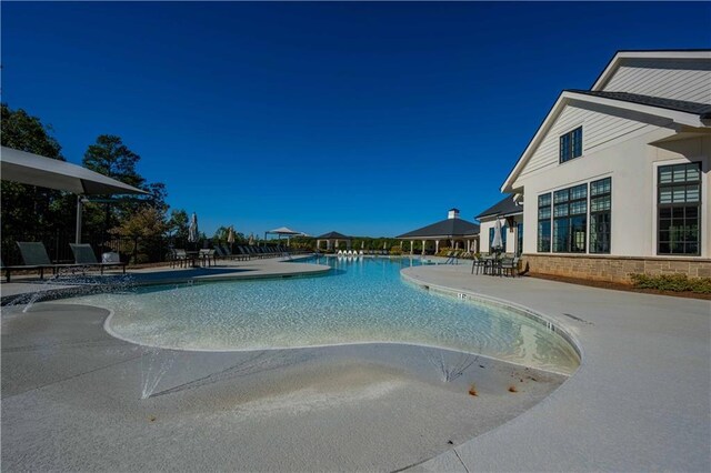 view of pool with a patio area