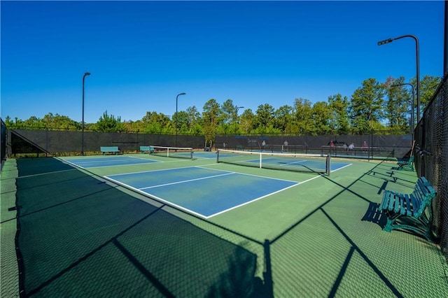 view of sport court featuring basketball court