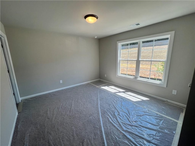320 Willow Cv, Canton, GA 30114 - carpeted empty room with baseboards and visible vents