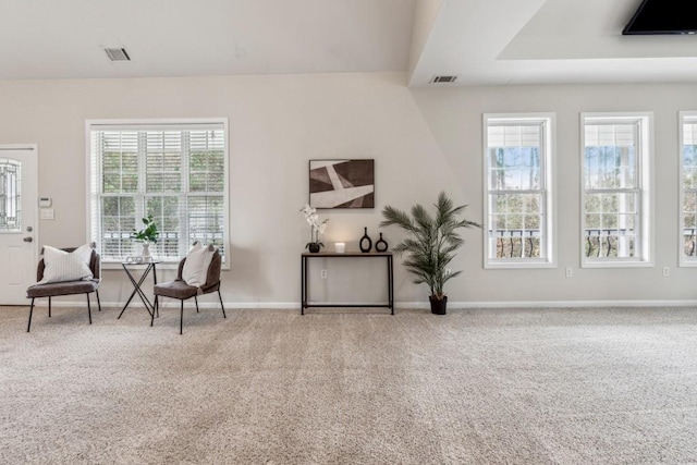 living area with carpet floors