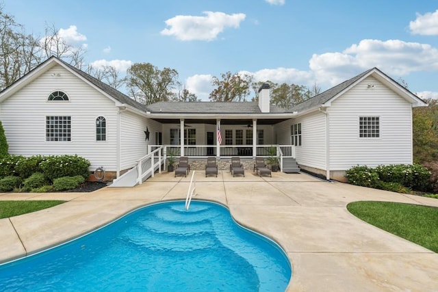 rear view of house with a patio