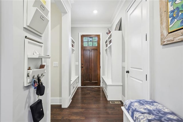 mudroom with dark hardwood / wood-style floors and crown molding