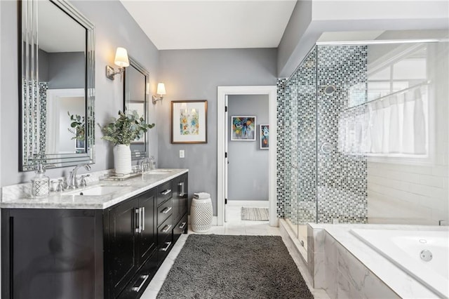 bathroom featuring shower with separate bathtub and vanity