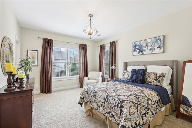 bedroom with light colored carpet