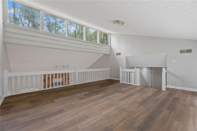 700 Bayliss Dr, Marietta, GA 30068 - unfurnished living room with stairs, a high ceiling, light wood-type flooring, baseboards, and beamed ceiling