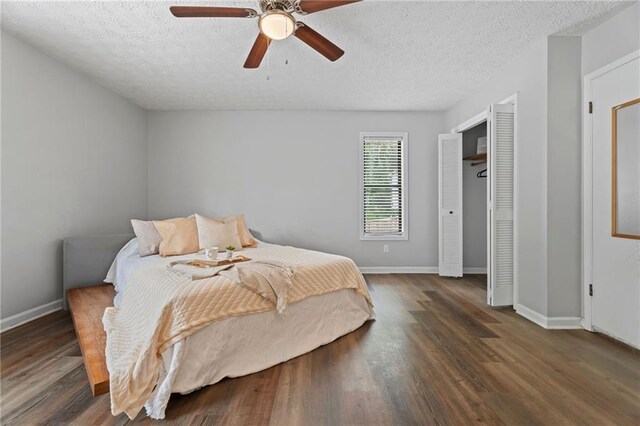 700 Bayliss Dr, Marietta, GA 30068 - unfurnished living room with a textured ceiling, visible vents, wood finished floors, and vaulted ceiling