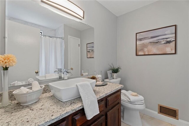 700 Bayliss Dr, Marietta, GA 30068 - bedroom with baseboards, wood finished floors, ceiling fan, and a textured ceiling