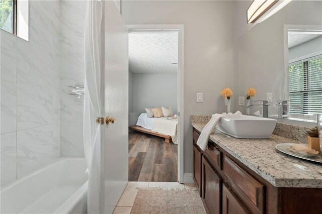 700 Bayliss Dr, Marietta, GA 30068 - bedroom featuring baseboards, wood finished floors, and a ceiling fan