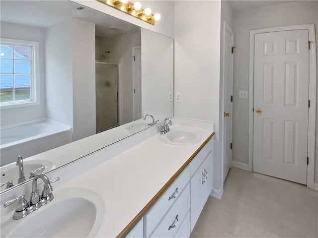 30 Trelawney Ct, Covington, GA 30016 - bathroom with a sink, a stall shower, and double vanity
