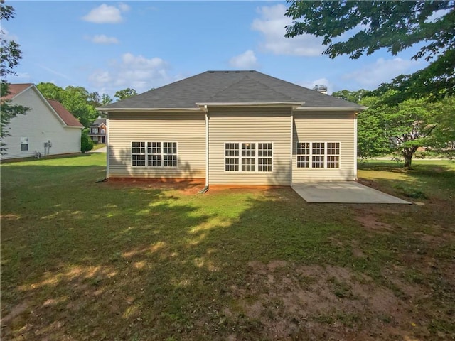 30 Trelawney Ct, Covington, GA 30016 - back of house featuring a yard and a patio area