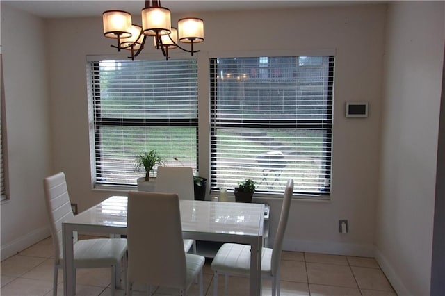 2814 Shellbark Rd, Decatur, GA 30035 - tiled dining space featuring a chandelier and baseboards