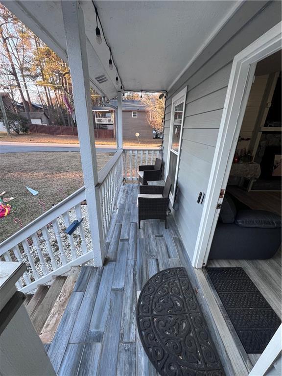 deck with covered porch