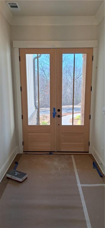 doorway featuring french doors