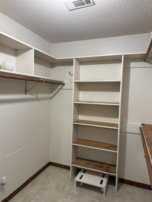 spacious closet with visible vents