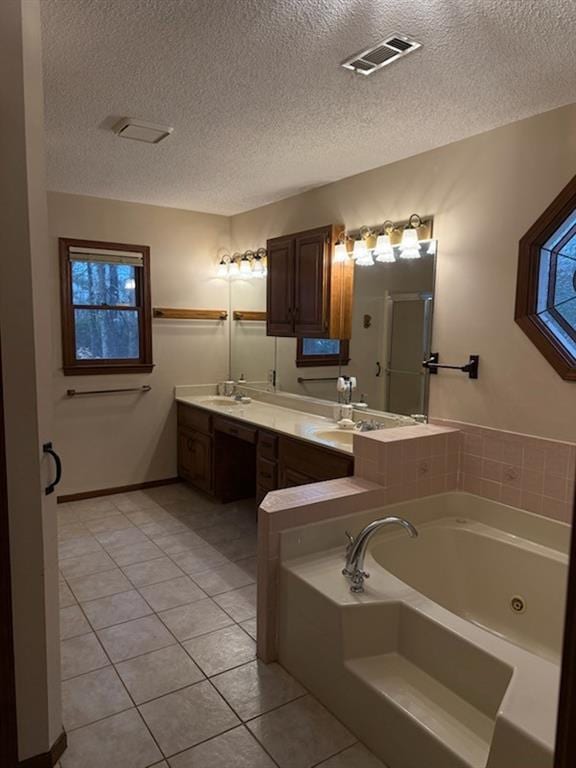 bathroom with tile patterned flooring, a shower stall, visible vents, and a whirlpool tub