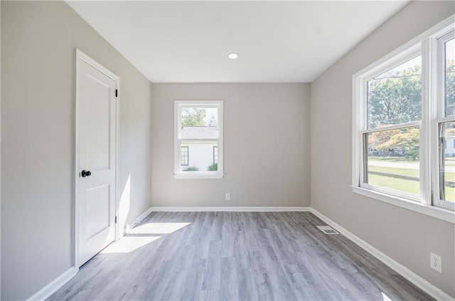 empty room featuring light hardwood / wood-style floors