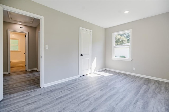 unfurnished bedroom with light hardwood / wood-style floors