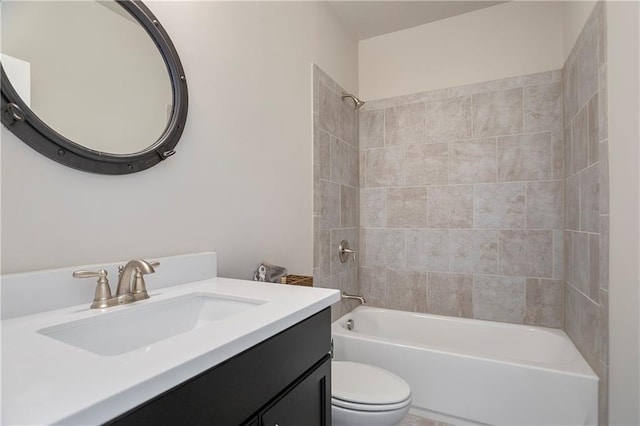 full bathroom featuring shower / bathtub combination, toilet, and vanity
