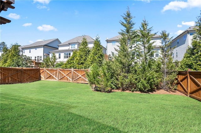view of yard with a residential view