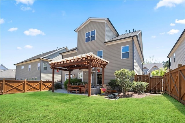 back of property with a pergola, a patio, and a gate