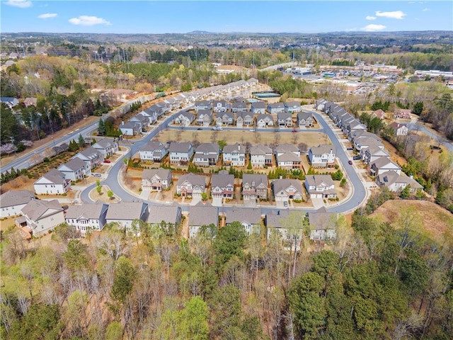 aerial overview of property's location with nearby suburban area