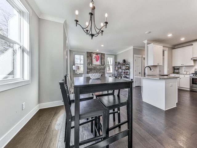 711 Carver Mill Rd, Talking Rock, GA 30175 - dining area featuring ornamental molding, a chandelier, recessed lighting, and dark wood-style floors