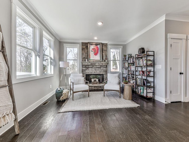 711 Carver Mill Rd, Talking Rock, GA 30175 - sitting room with crown molding, wood finished floors, a stone fireplace, and recessed lighting