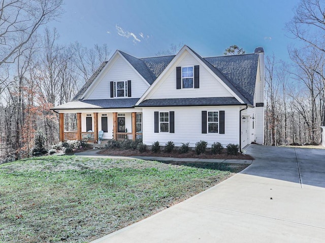 711 Carver Mill Rd, Talking Rock, GA 30175 - view of front of home with covered porch, concrete driveway, a front lawn, and roof with shingles