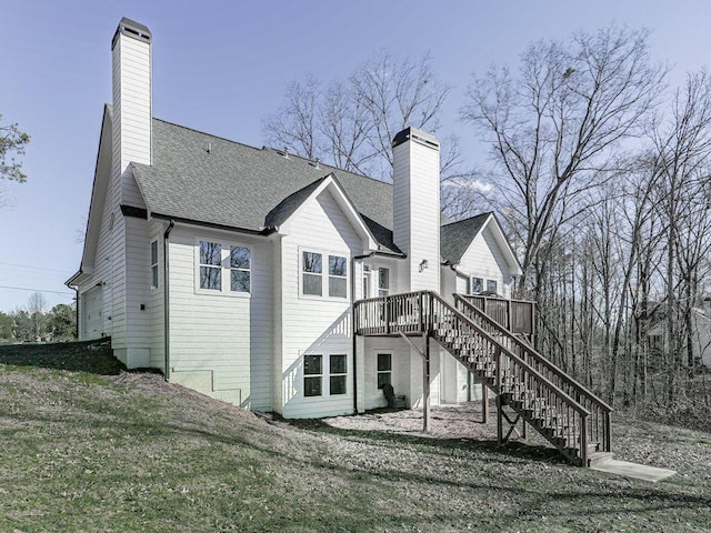 711 Carver Mill Rd, Talking Rock, GA 30175 - rear view of house with a chimney, stairway, a deck, a shingled roof, and a yard