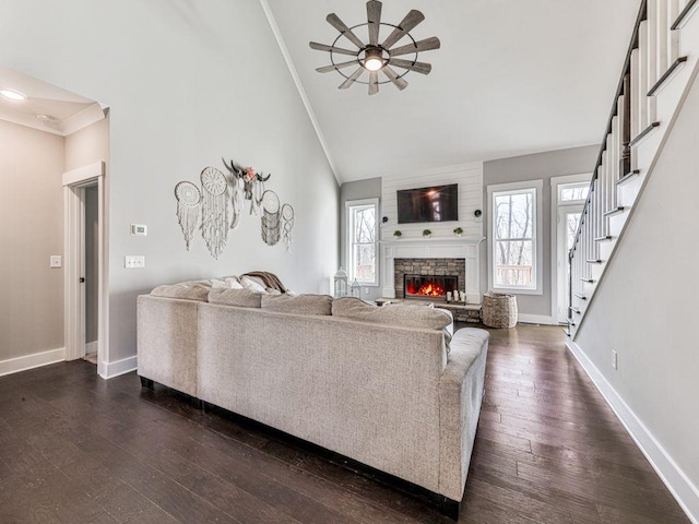 711 Carver Mill Rd, Talking Rock, GA 30175 - living room featuring crown molding, a ceiling fan, a stone fireplace, dark wood-style floors, and high vaulted ceiling