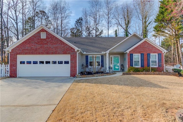 ranch-style home featuring a garage, brick siding, driveway, and a front lawn