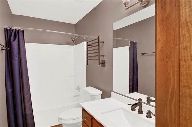 bathroom with toilet, shower / bathtub combination with curtain, and vanity