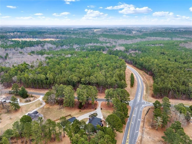 bird's eye view with a view of trees