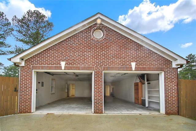 garage with fence