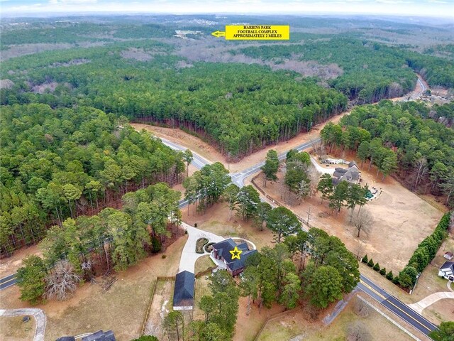 bird's eye view featuring a view of trees